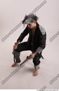 10 2019 01 JACK PIRATE SITTING POSE WITH GUN